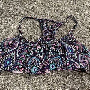 A Large colorful swimsuit top